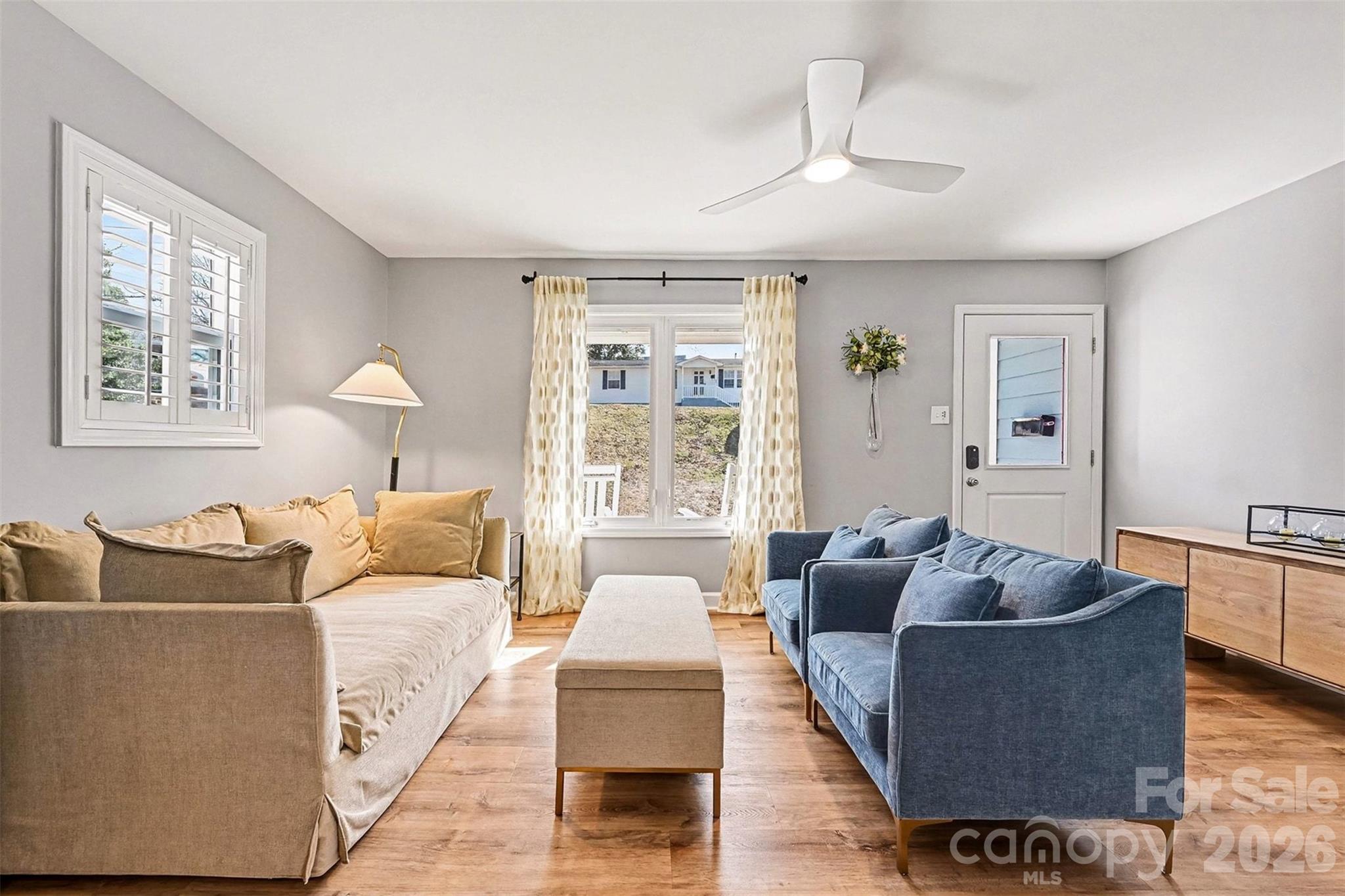 300 Calhoun Street Fort Mill, SC 29715 - Photo 3 of 30 a living room with furniture and a large window