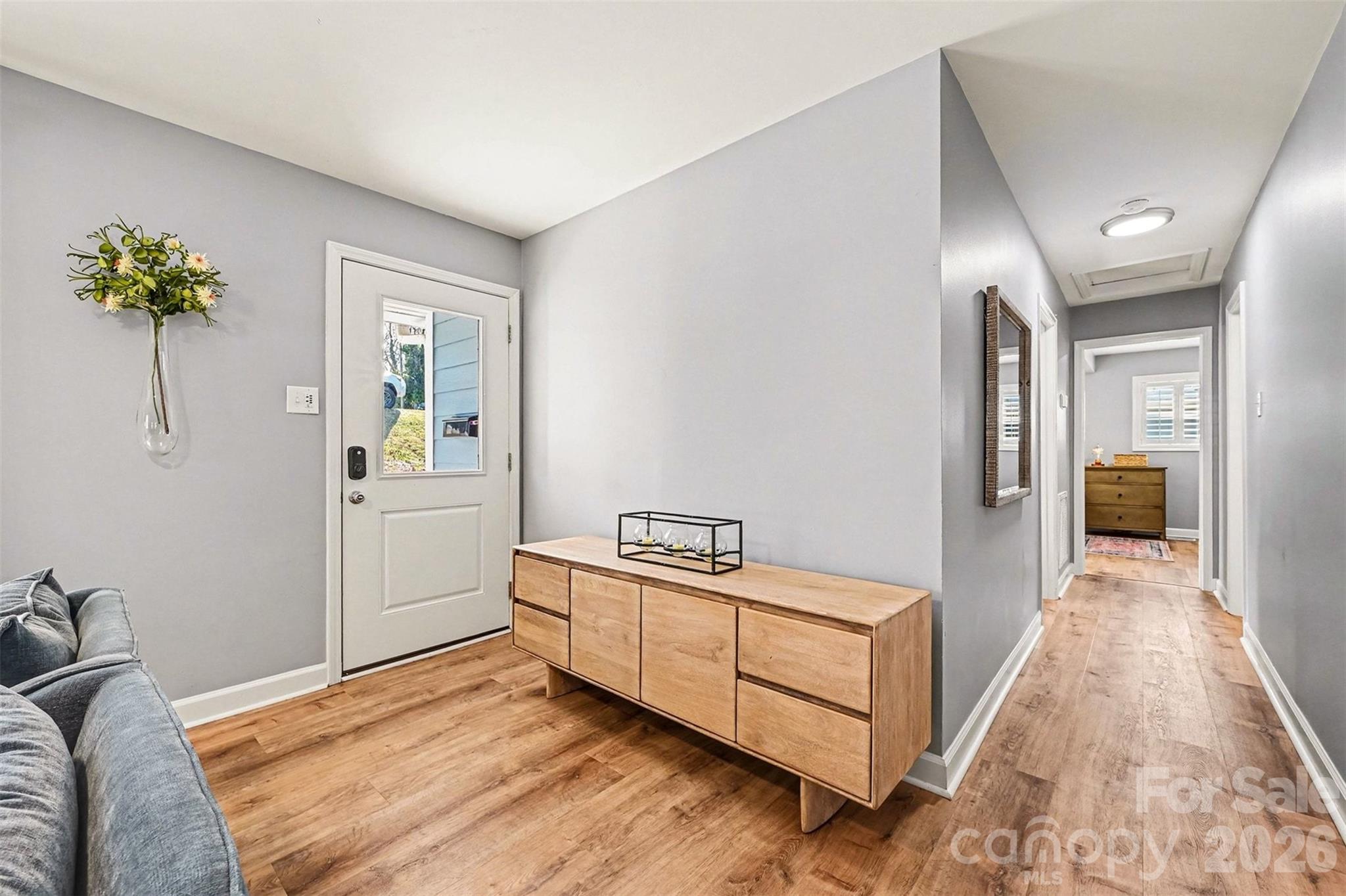 300 Calhoun Street Fort Mill, SC 29715 - Photo 5 of 30 a room with a bed and a potted plant