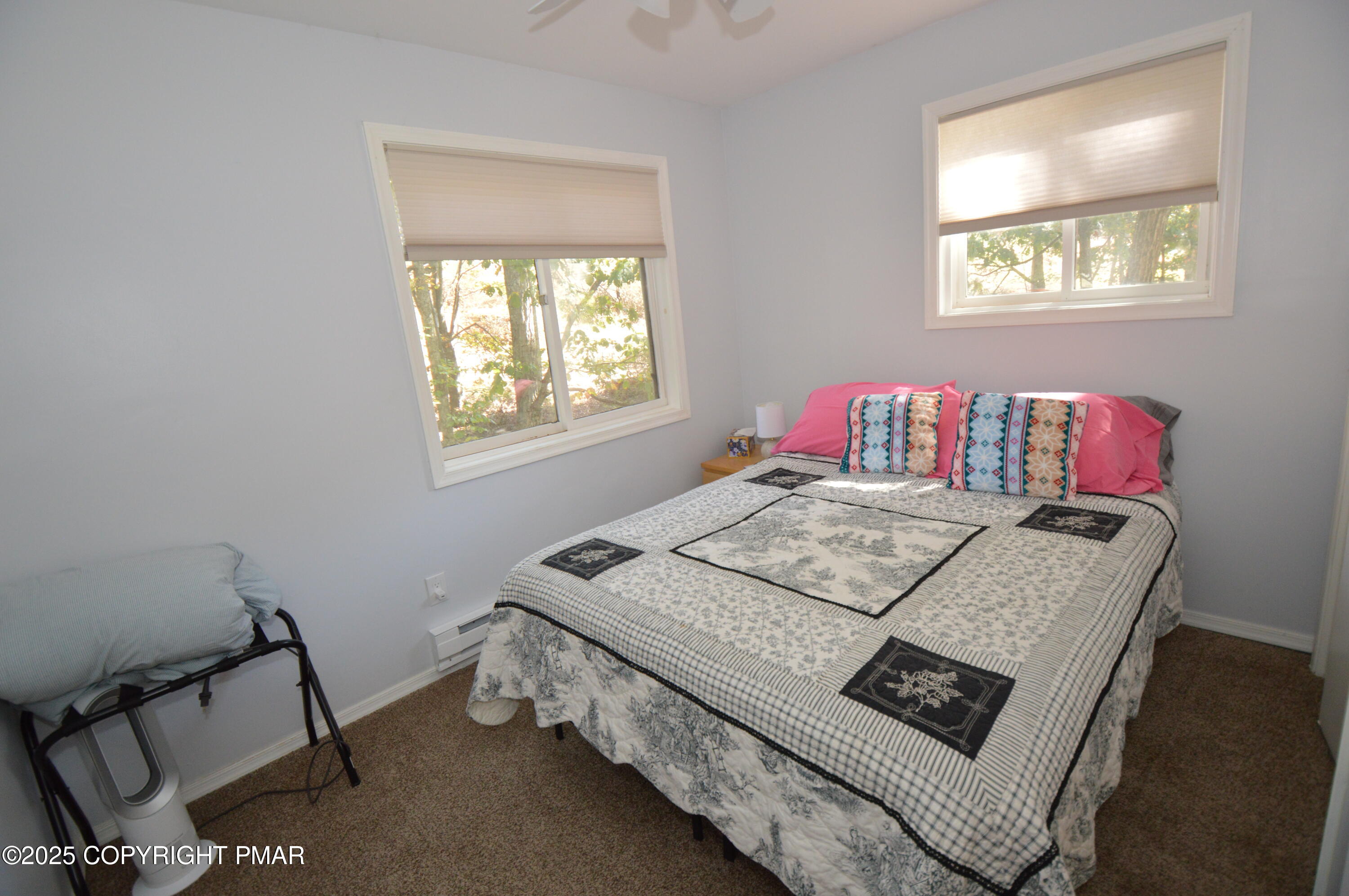 128 Ashley Court Bushkill, PA 18324 - Photo 13 of 43 a bedroom with a bed and a window
