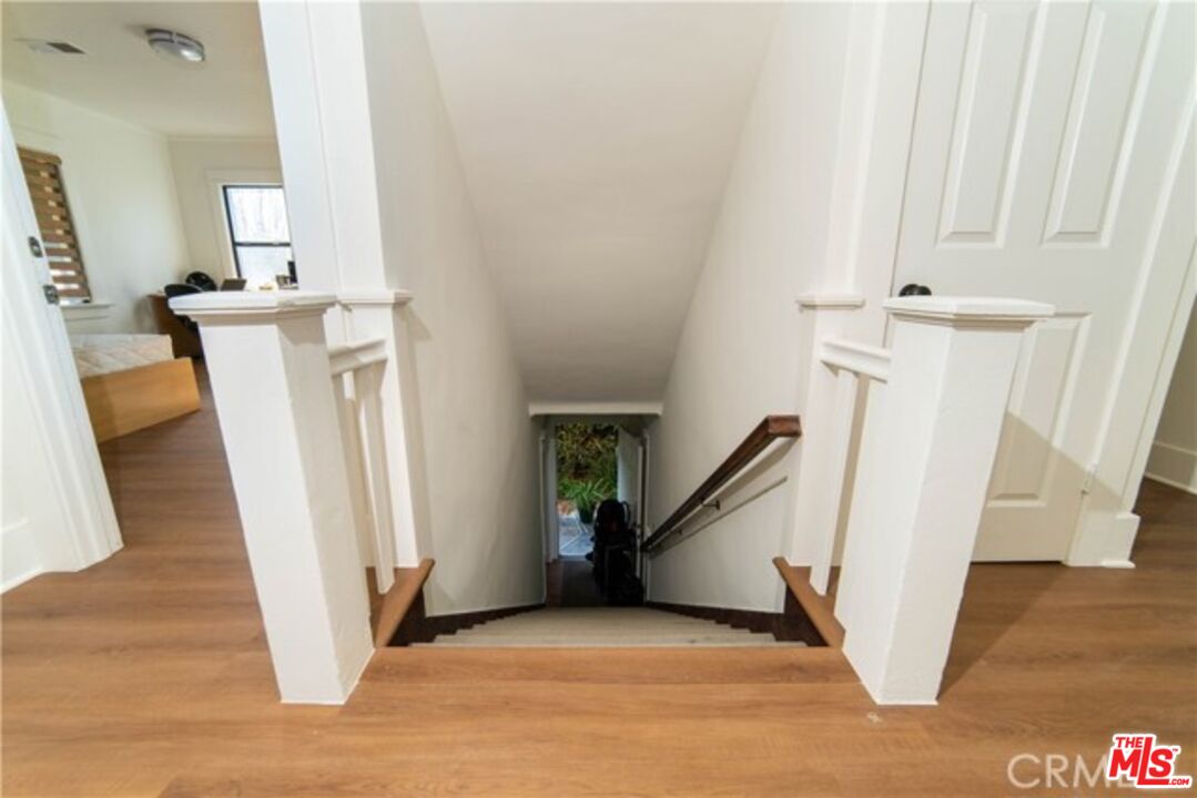 1023 South Wilton Place Los Angeles, CA 90019 - Photo 16 of 34 a view of a livingroom with a staircase