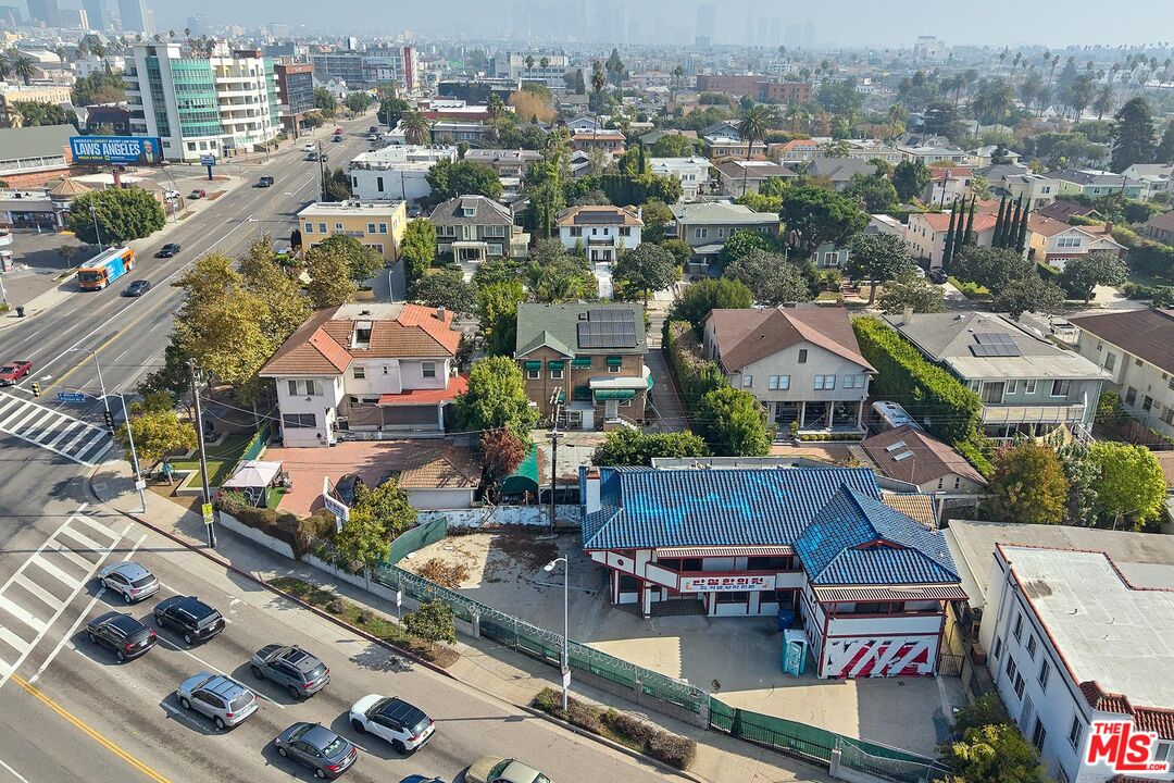 1023 South Wilton Place Los Angeles, CA 90019 - Photo 34 of 34 an aerial view of residential houses with outdoor space