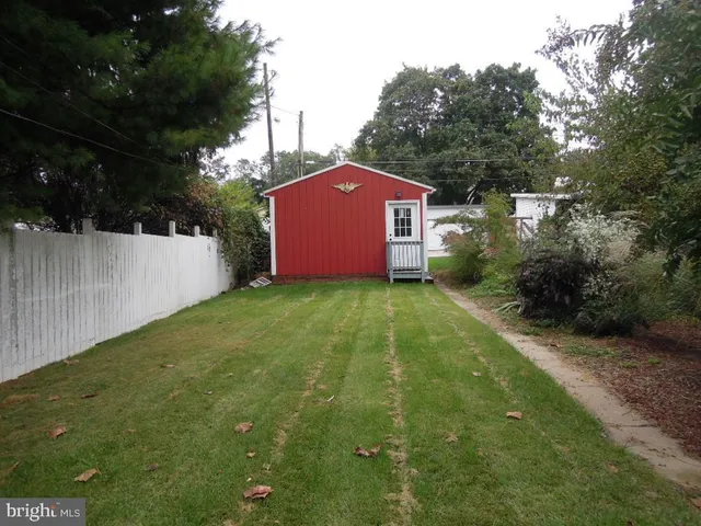 a view of a car parked in front of a building