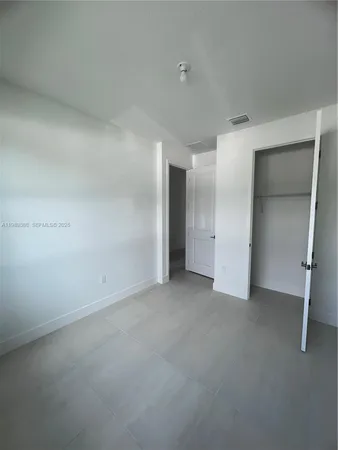 wooden floor in a hall with an entryway