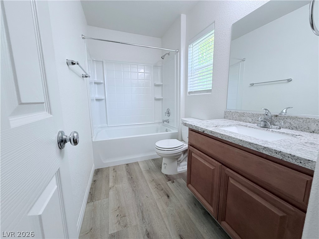 3610 Wireless Court Las Vegas, NV 89129 - Photo 10 of 15 Refined bathroom with a large vanity and bathtub-shower combo.