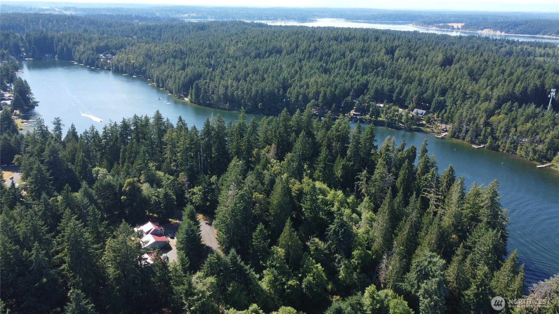 10114 Selma Circle Anderson Island, WA 98303 - Photo 4 of 5 a view of a lake and green valley