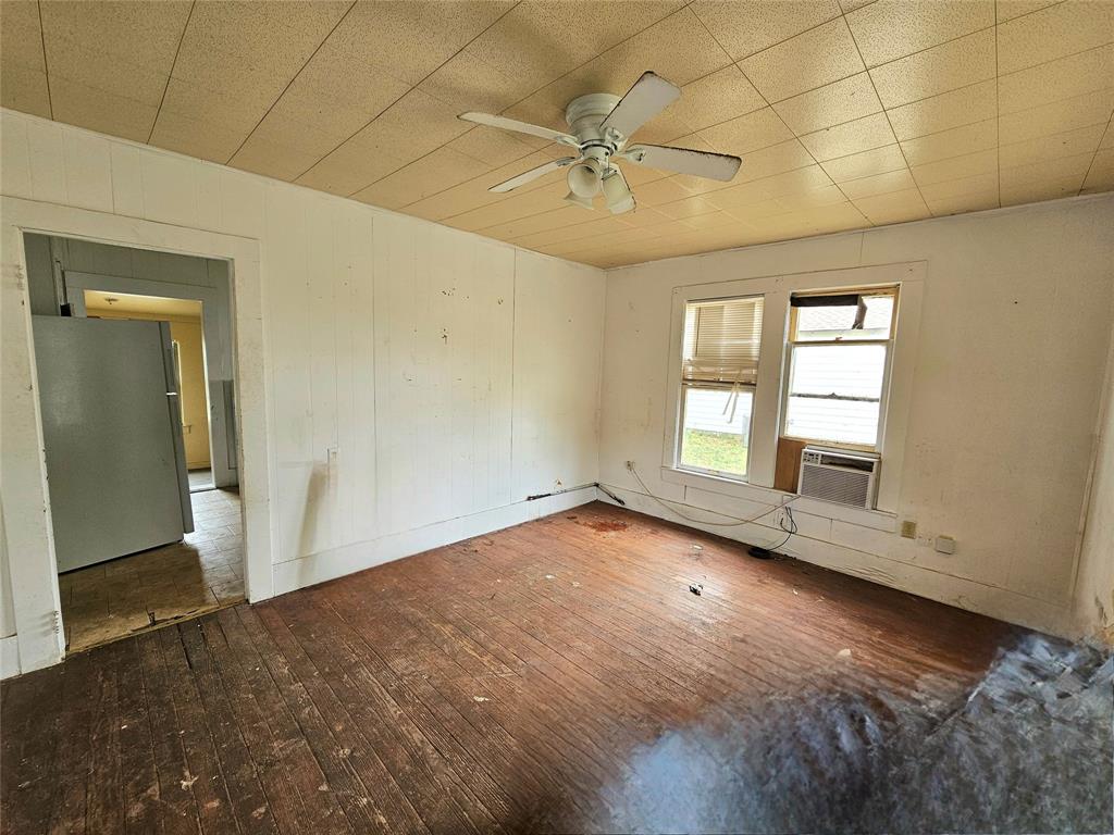 704 2nd Street Bangs, TX 76823 - Photo 2 of 10 a view of an empty room with a window