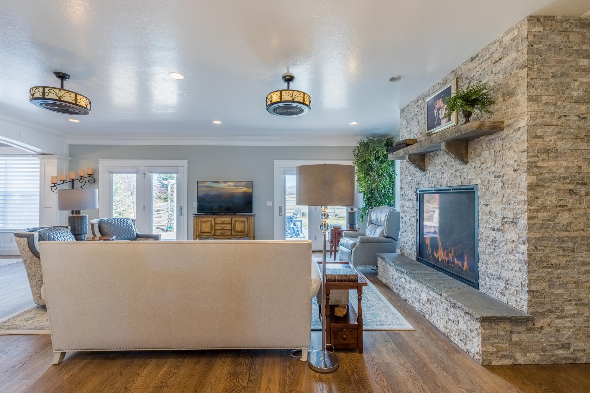 490 Cobble Drive Montrose, CO 81403 - Photo 22 of 58 a living room with furniture and a fireplace