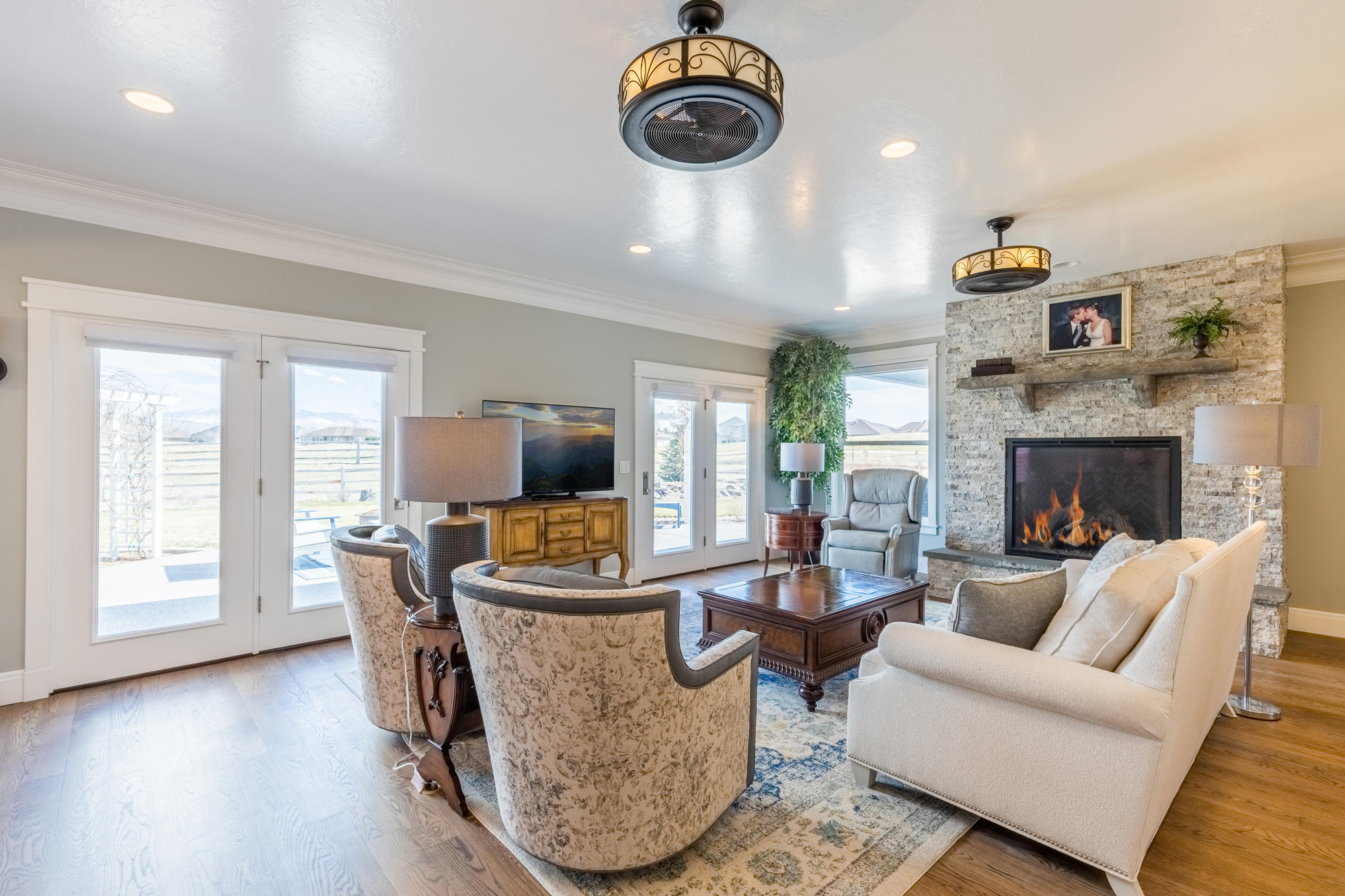 490 Cobble Drive Montrose, CO 81403 - Photo 24 of 58 a living room with furniture and a fireplace