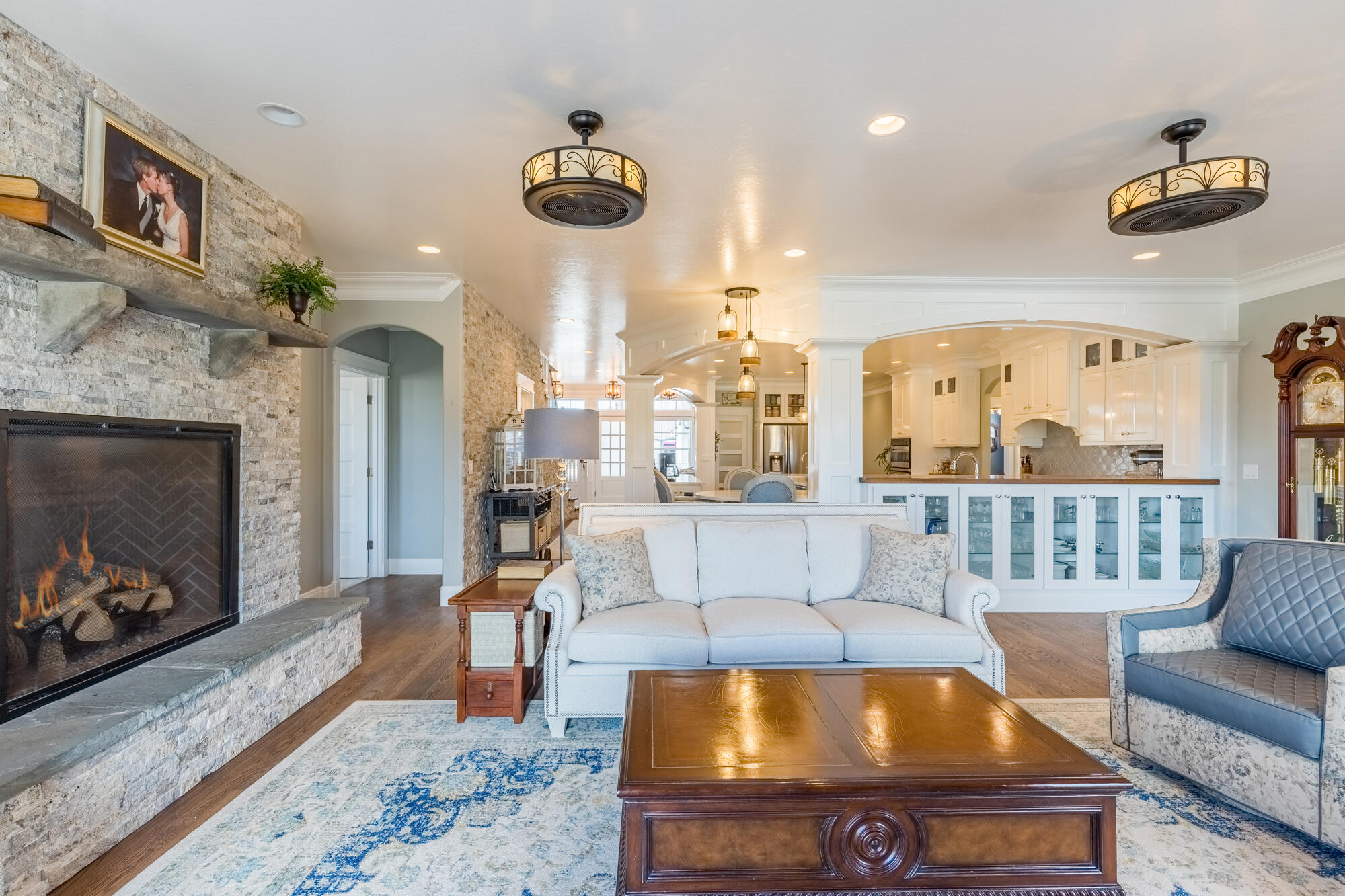 490 Cobble Drive Montrose, CO 81403 - Photo 26 of 58 a living room with furniture and a fireplace