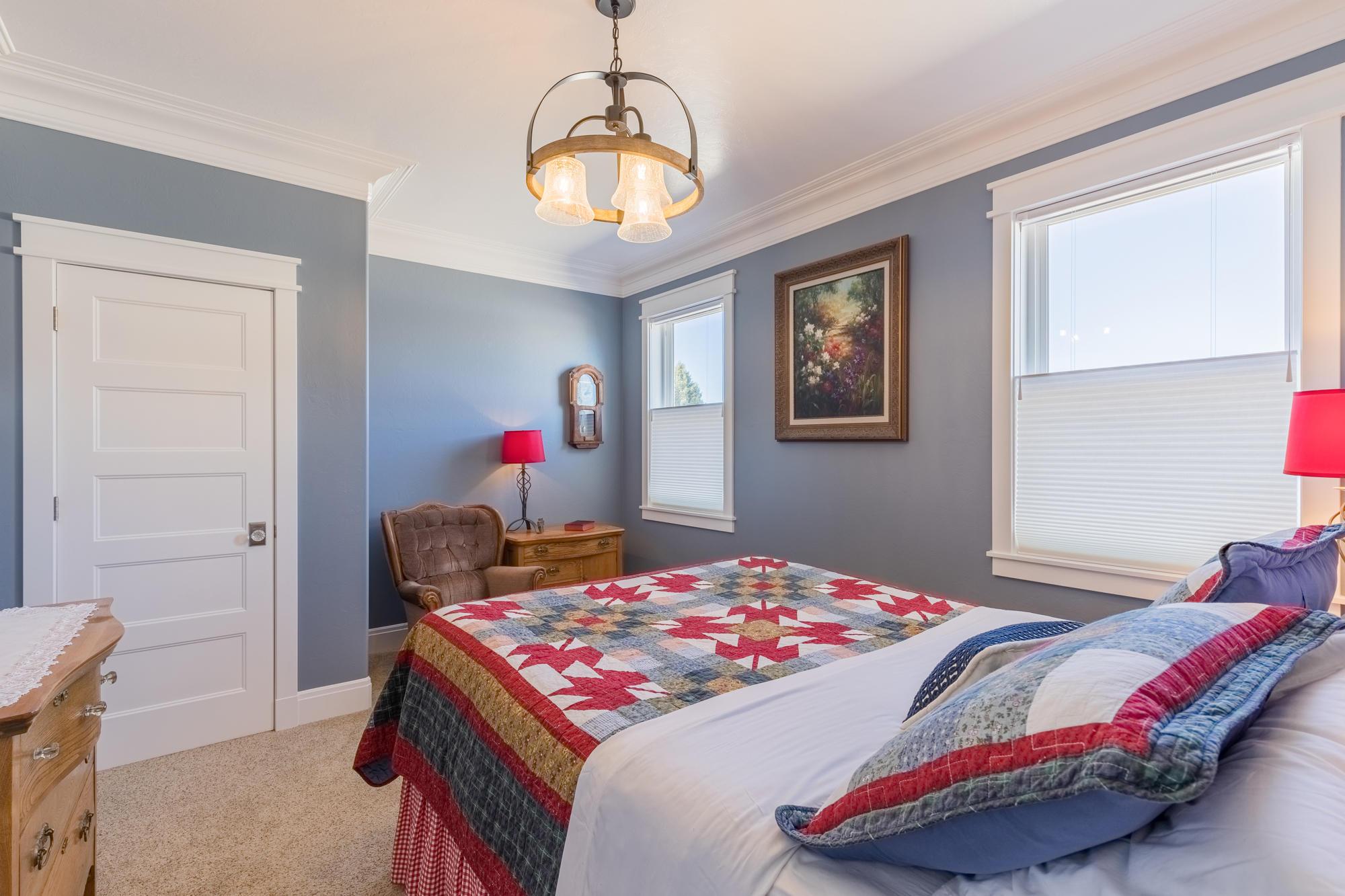 490 Cobble Drive Montrose, CO 81403 - Photo 28 of 58 a bedroom with a bed and dresser