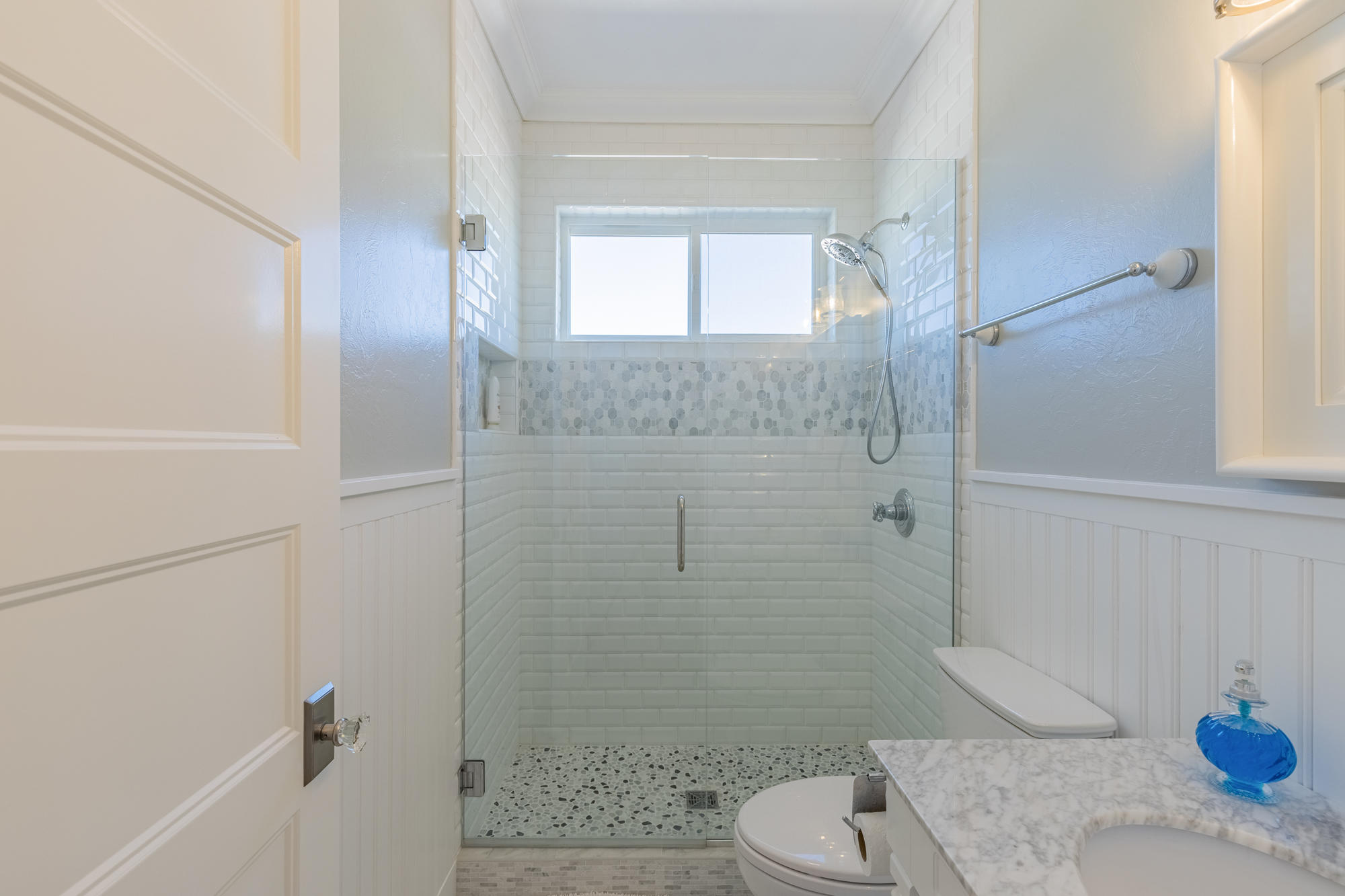 490 Cobble Drive Montrose, CO 81403 - Photo 30 of 58 a bathroom with a granite countertop bathtub shower sink and toilet
