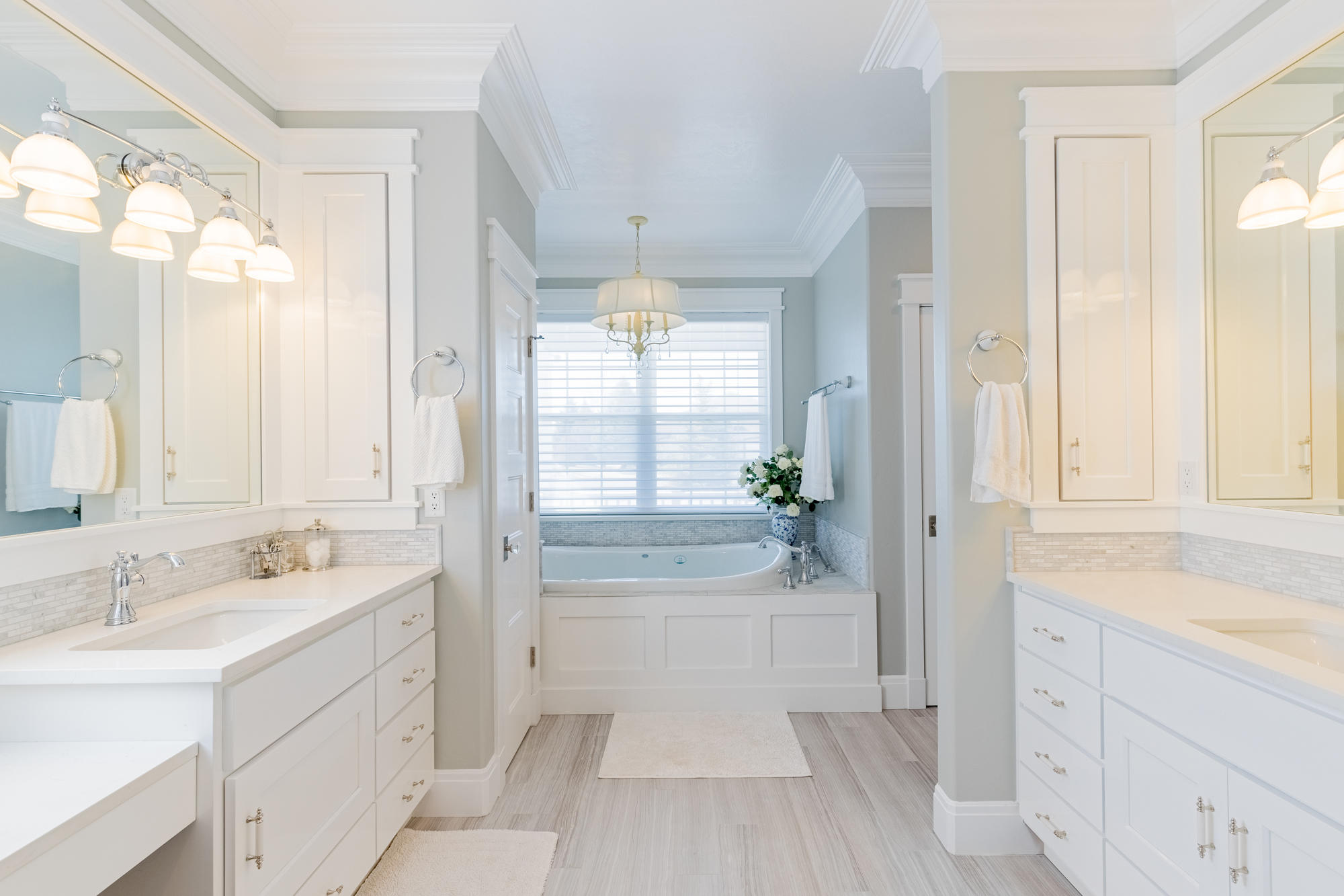 490 Cobble Drive Montrose, CO 81403 - Photo 39 of 58 a spacious bathroom with a tub sink and mirror