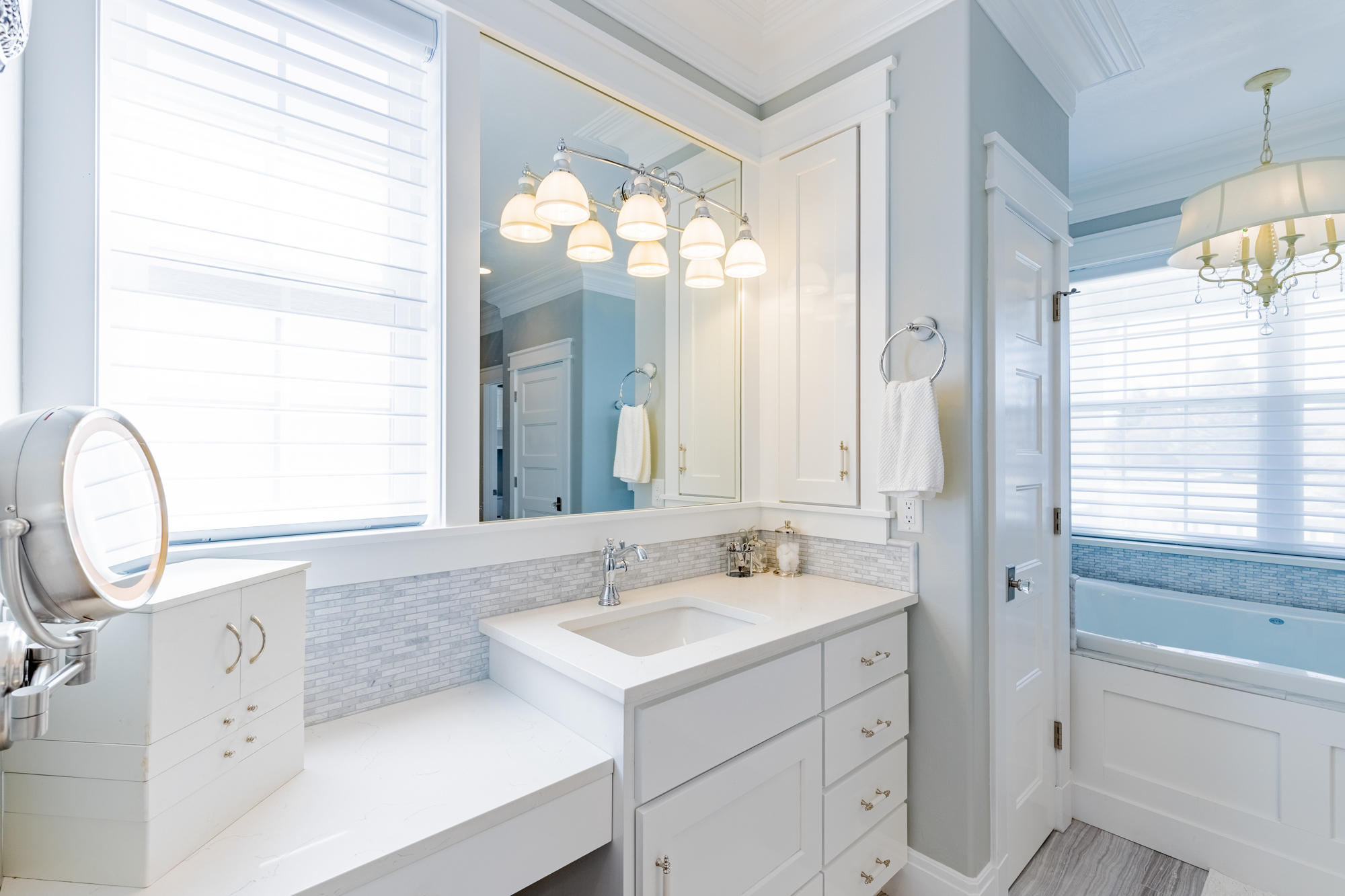 490 Cobble Drive Montrose, CO 81403 - Photo 40 of 58 a bathroom with a sink and a mirror