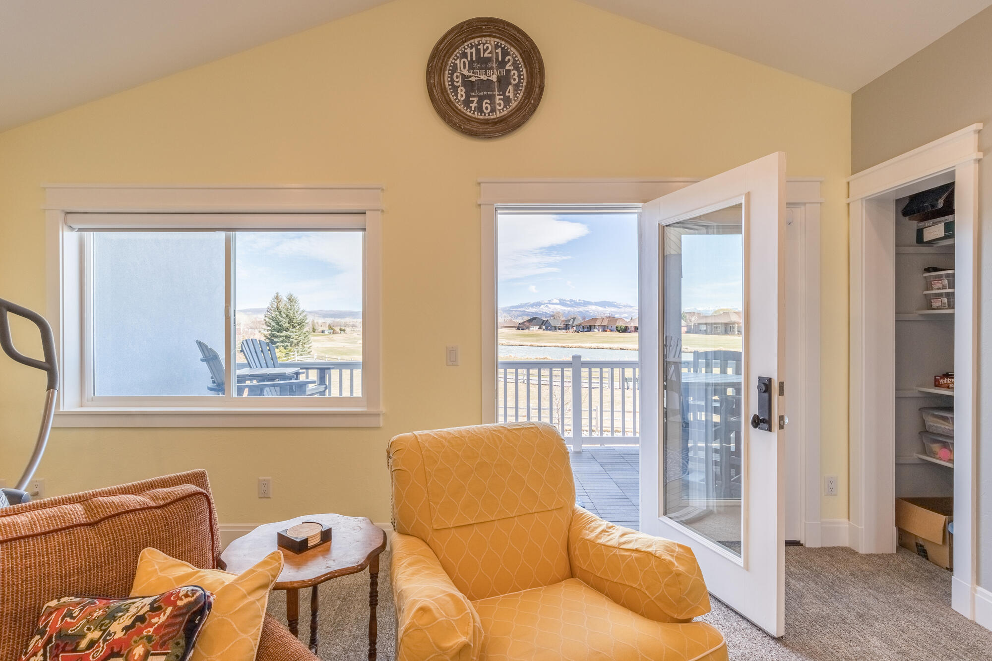 490 Cobble Drive Montrose, CO 81403 - Photo 46 of 58 a living room with furniture a window and a table