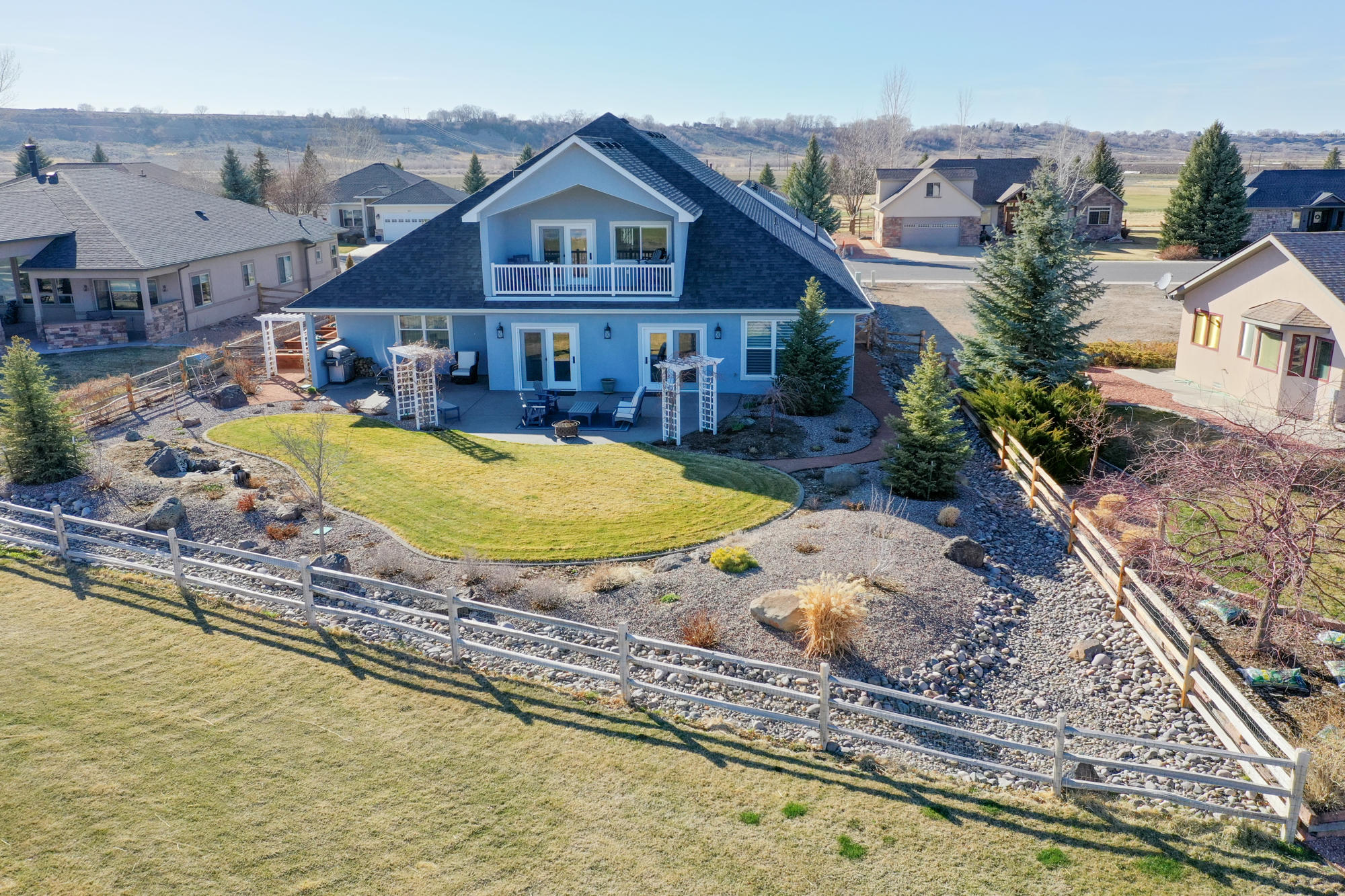 490 Cobble Drive Montrose, CO 81403 - Photo 56 of 58 a view of a house with swimming pool
