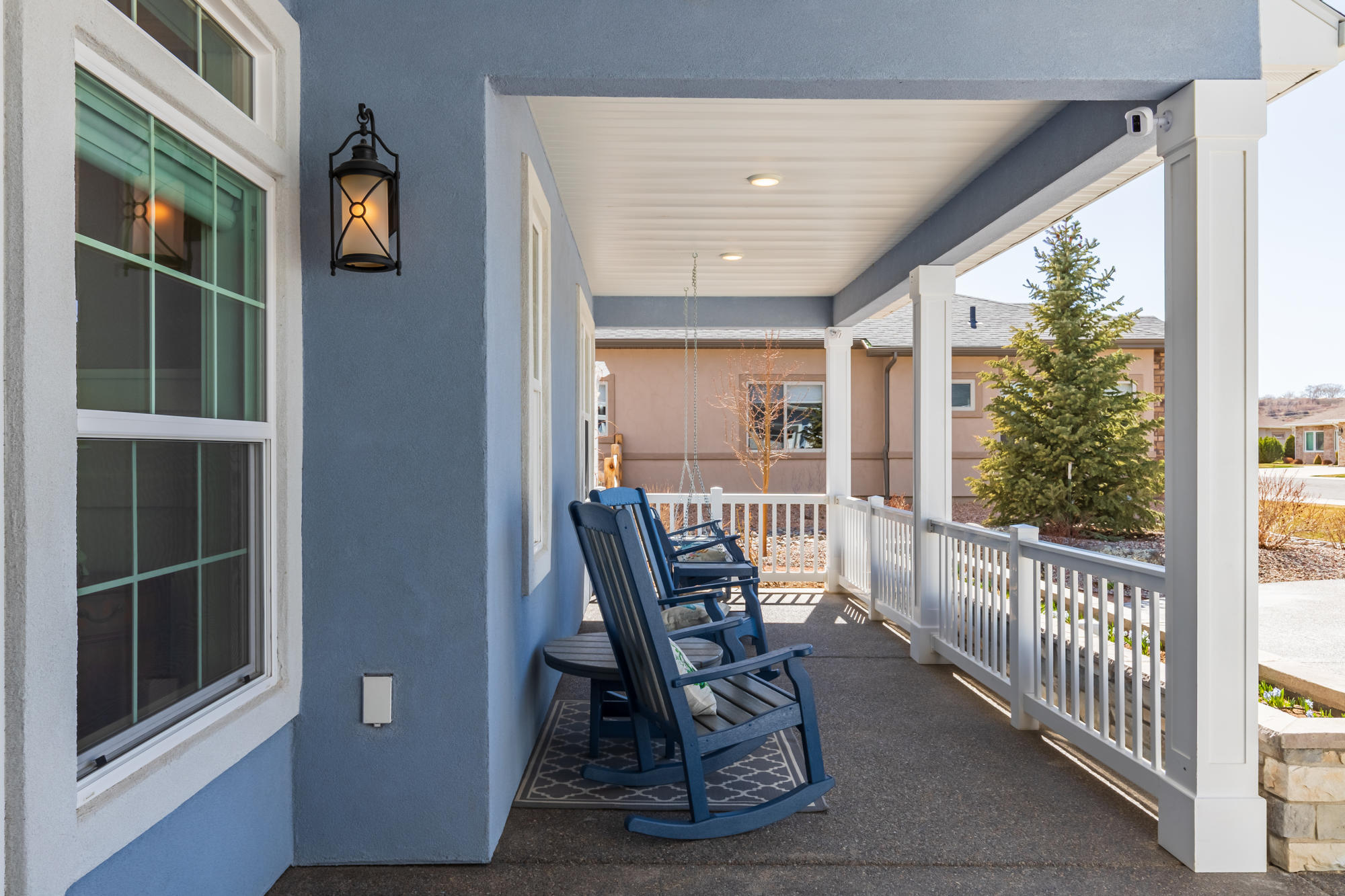 490 Cobble Drive Montrose, CO 81403 - Photo 9 of 58 a view of a hallway with wooden floor and windows
