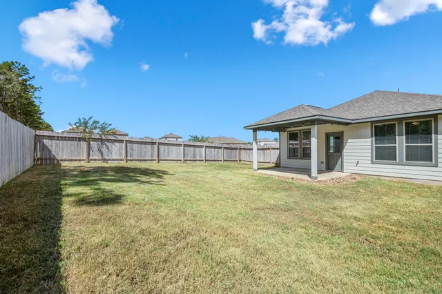 a swimming pool with an outdoor space