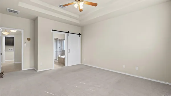 an empty room with fan