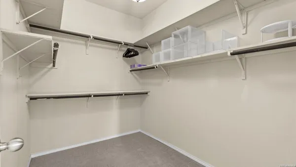 a view of a room with racks on the wall