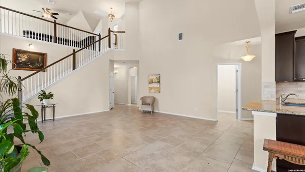 a view of a livingroom with stairs