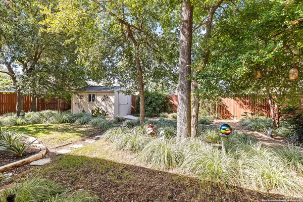 a view of house with yard