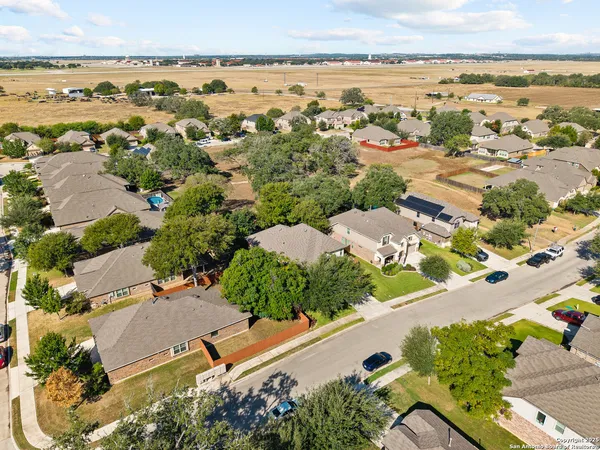 an aerial view of a city with lots of residential buildings