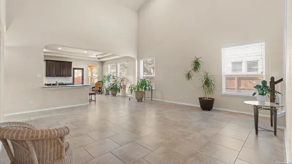 a view of livingroom with furniture and floor to ceiling window