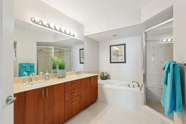 a large white kitchen with a large window