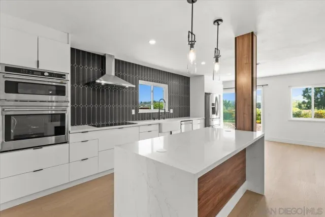 a view of living room kitchen