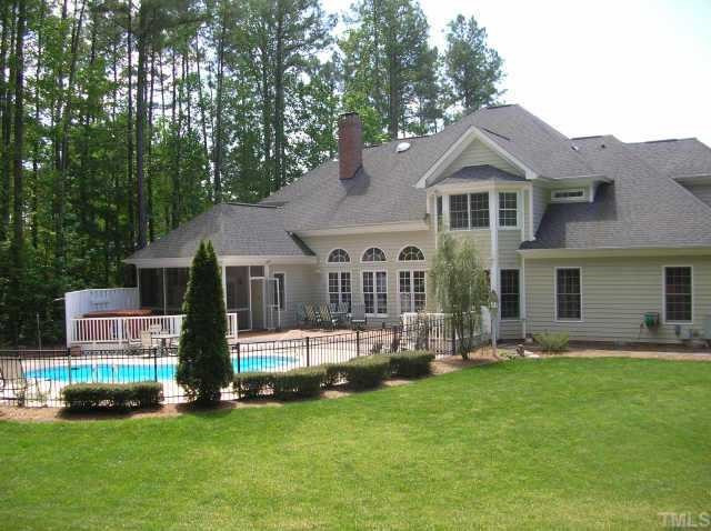 5904 Weather Rock Court Raleigh, NC 27613 - Photo 7 of 8 Back yard view of kidney shaped gunite pool, 8 person hot tub,over sized deck, screened in porch off the Master Suite Other