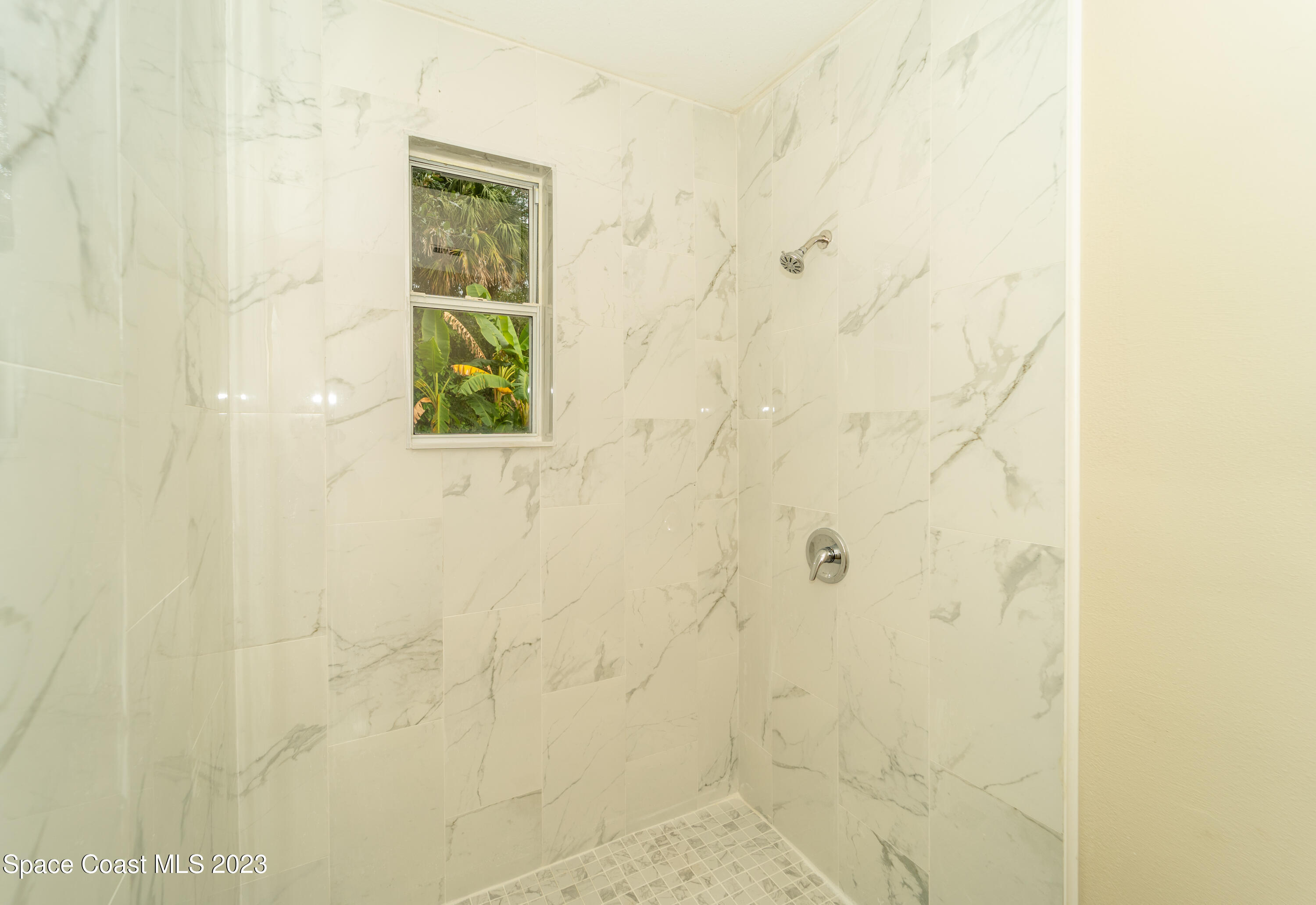 254 Lime Street Cocoa, FL 32926 - Photo 13 of 16 a bathroom with a shower