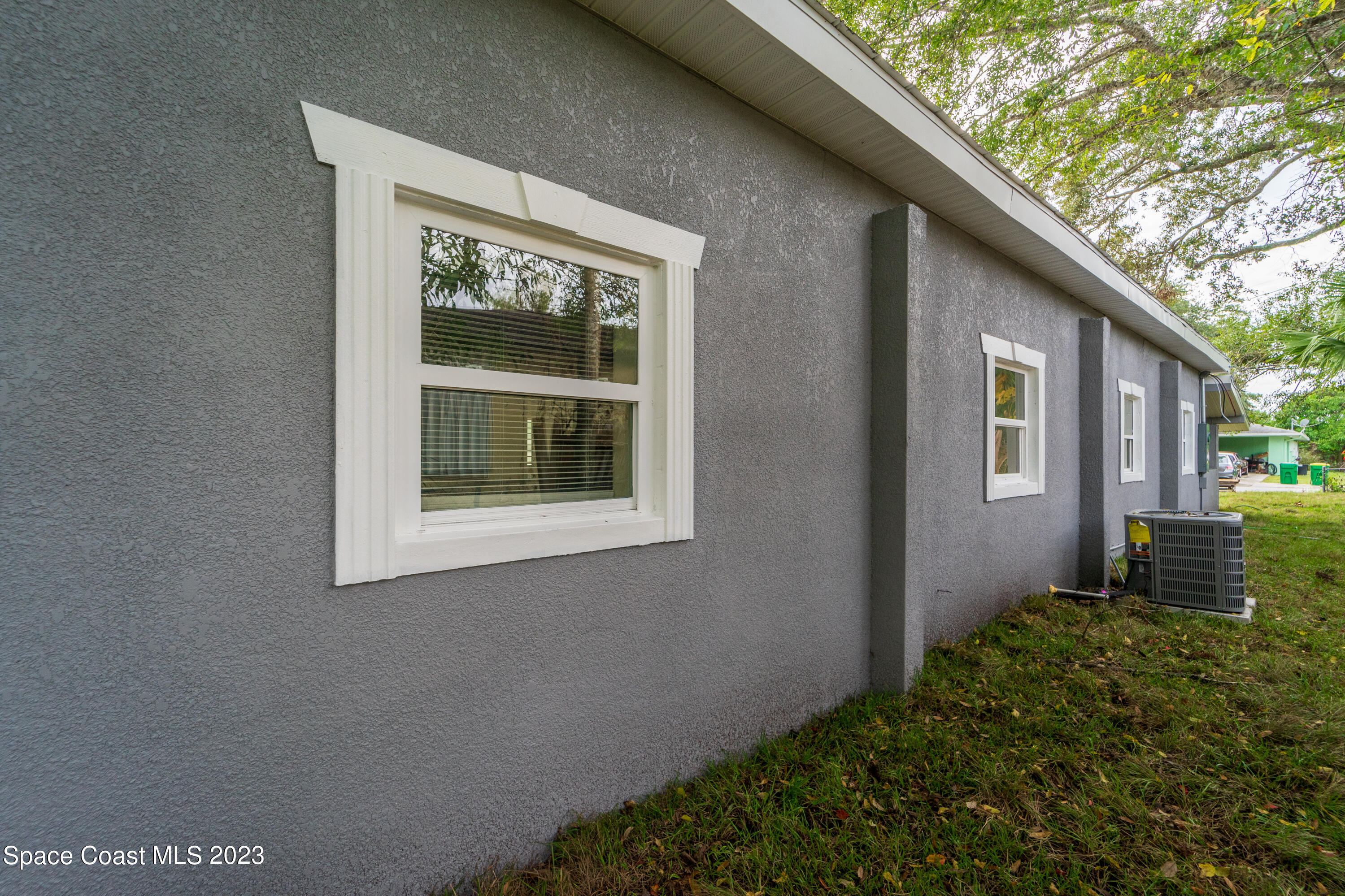 254 Lime Street Cocoa, FL 32926 - Photo 16 of 16 a backyard of a house with lots of green space