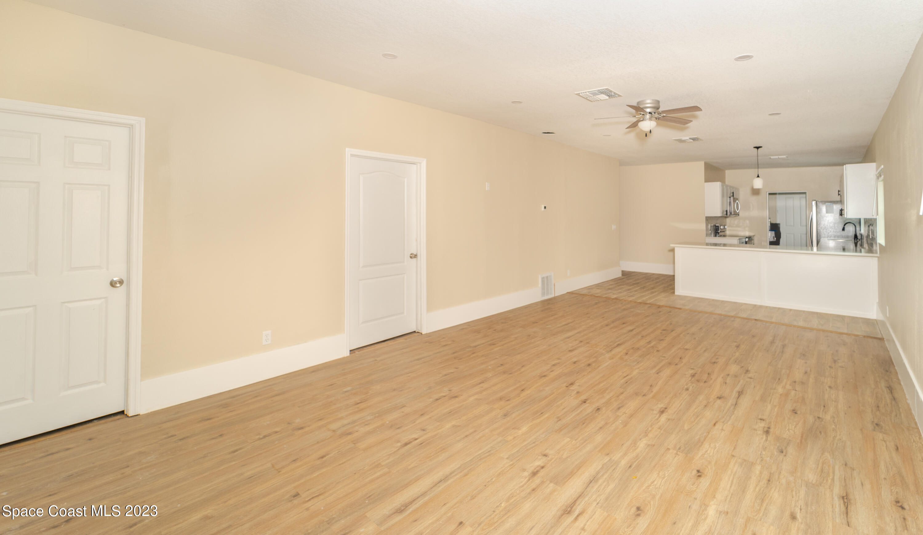 254 Lime Street Cocoa, FL 32926 - Photo 7 of 16 wooden floor in an empty room