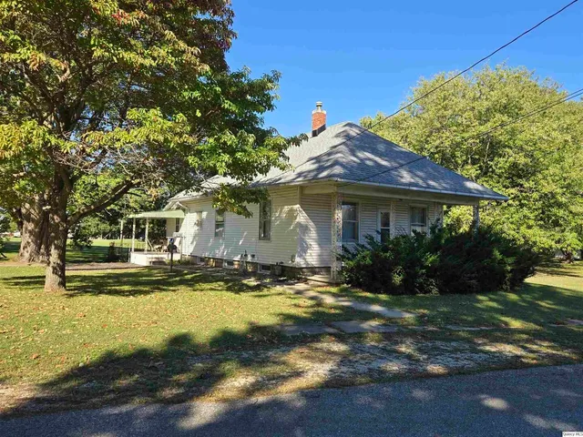 a view of a house with swimming pool