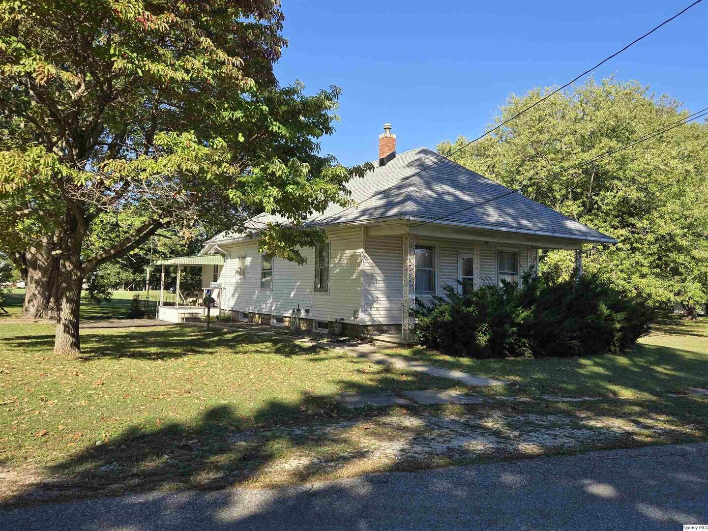 a view of a house with swimming pool