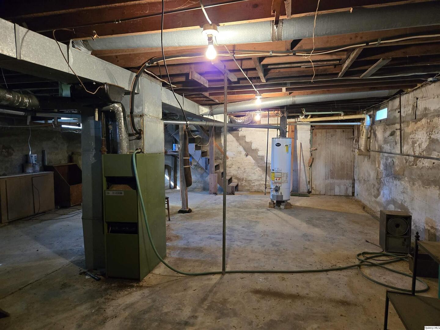 401 Ravenscroft Avenue Versailles, IL 62378 - Photo 13 of 14 a view of a garage with wooden wall