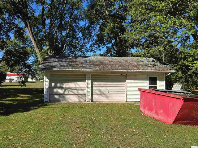 a view of a backyard with a garden