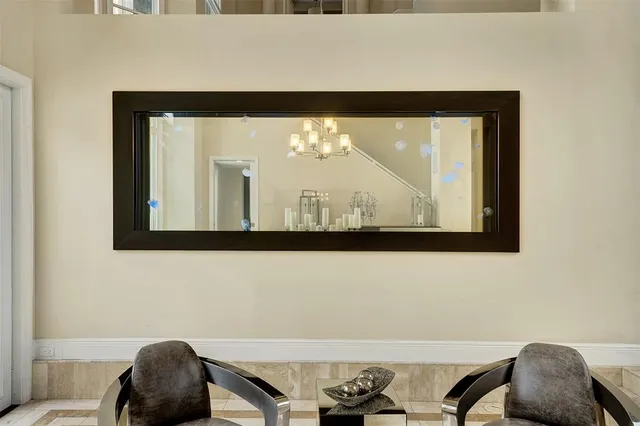 a bathroom with a sink and a large mirror