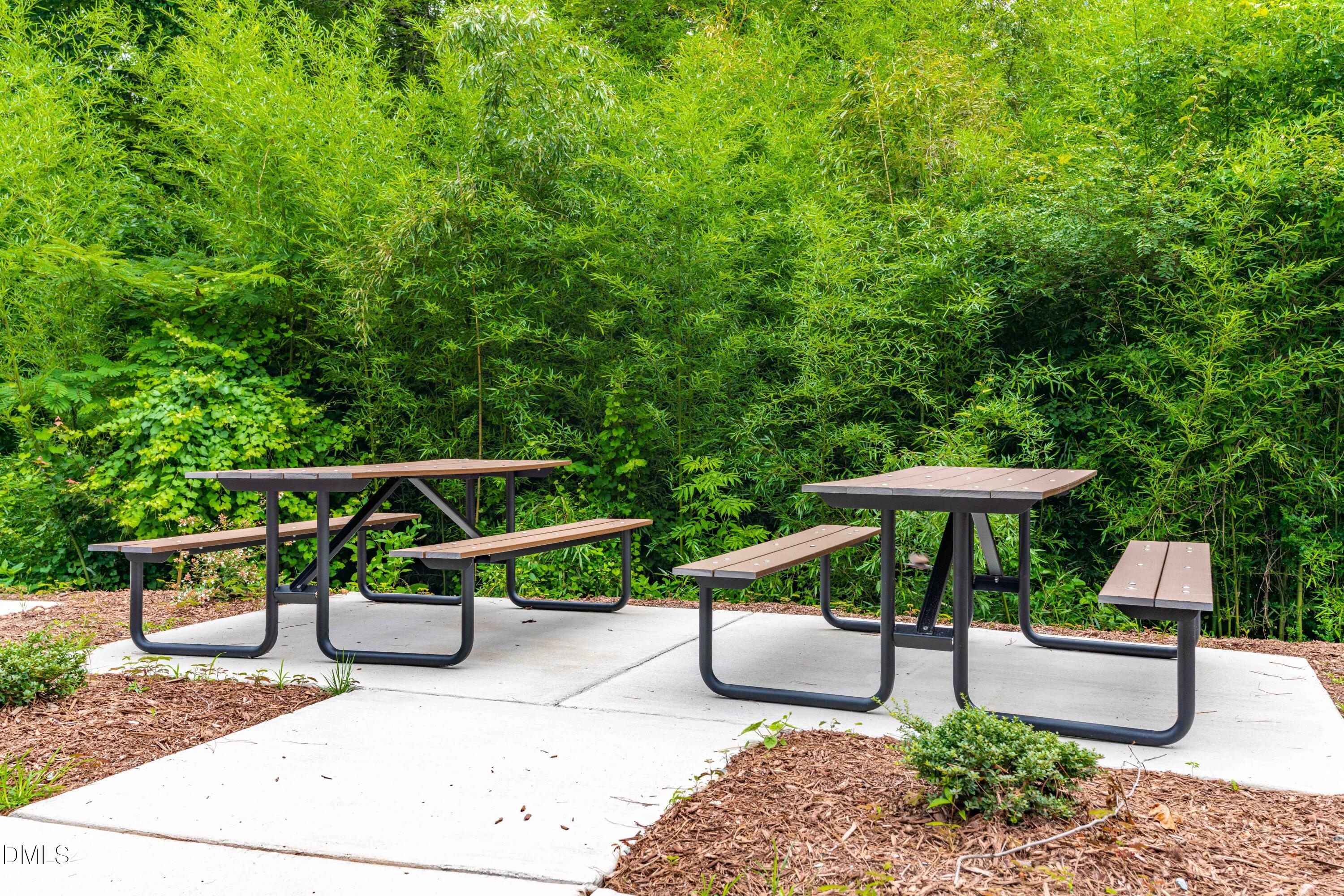 303 Linwood Street, Unit 302 Apex, NC 27502 - Photo 18 of 19 a view of outdoor space yard deck patio and outdoor kitchen