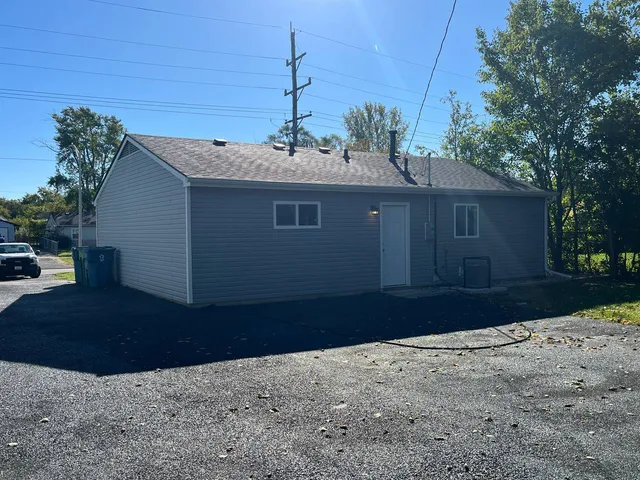 a view of a house with a swimming pool