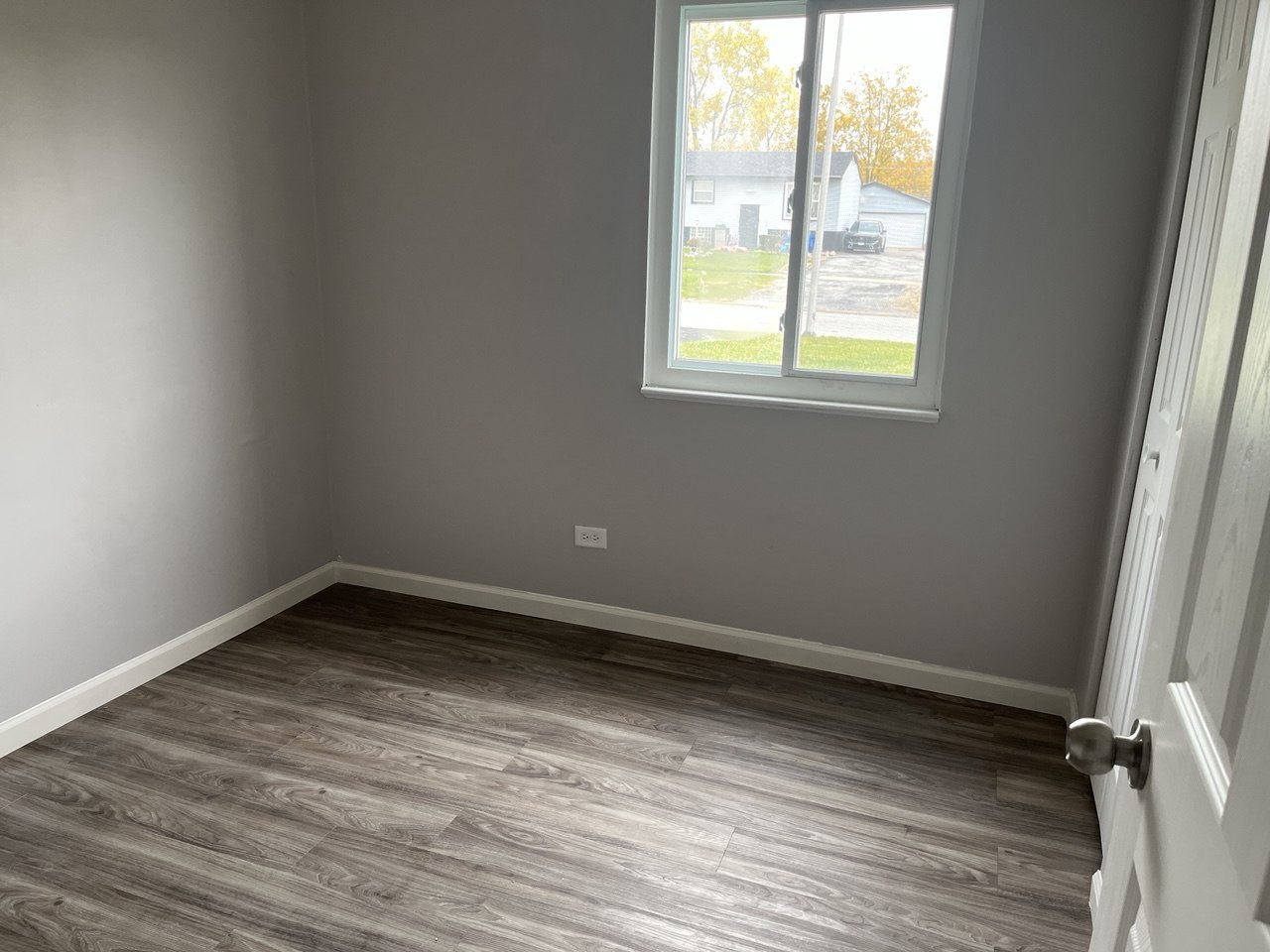 1918 Ashland Avenue Chicago Heights, IL 60411 - Photo 6 of 12 an empty room with a window