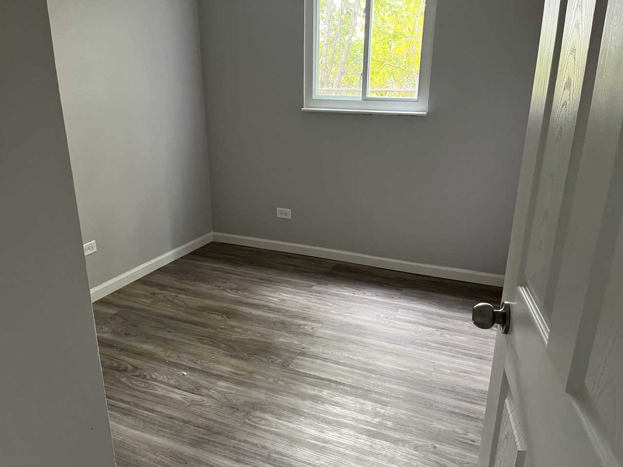 1918 Ashland Avenue Chicago Heights, IL 60411 - Photo 9 of 12 wooden floor in an empty room