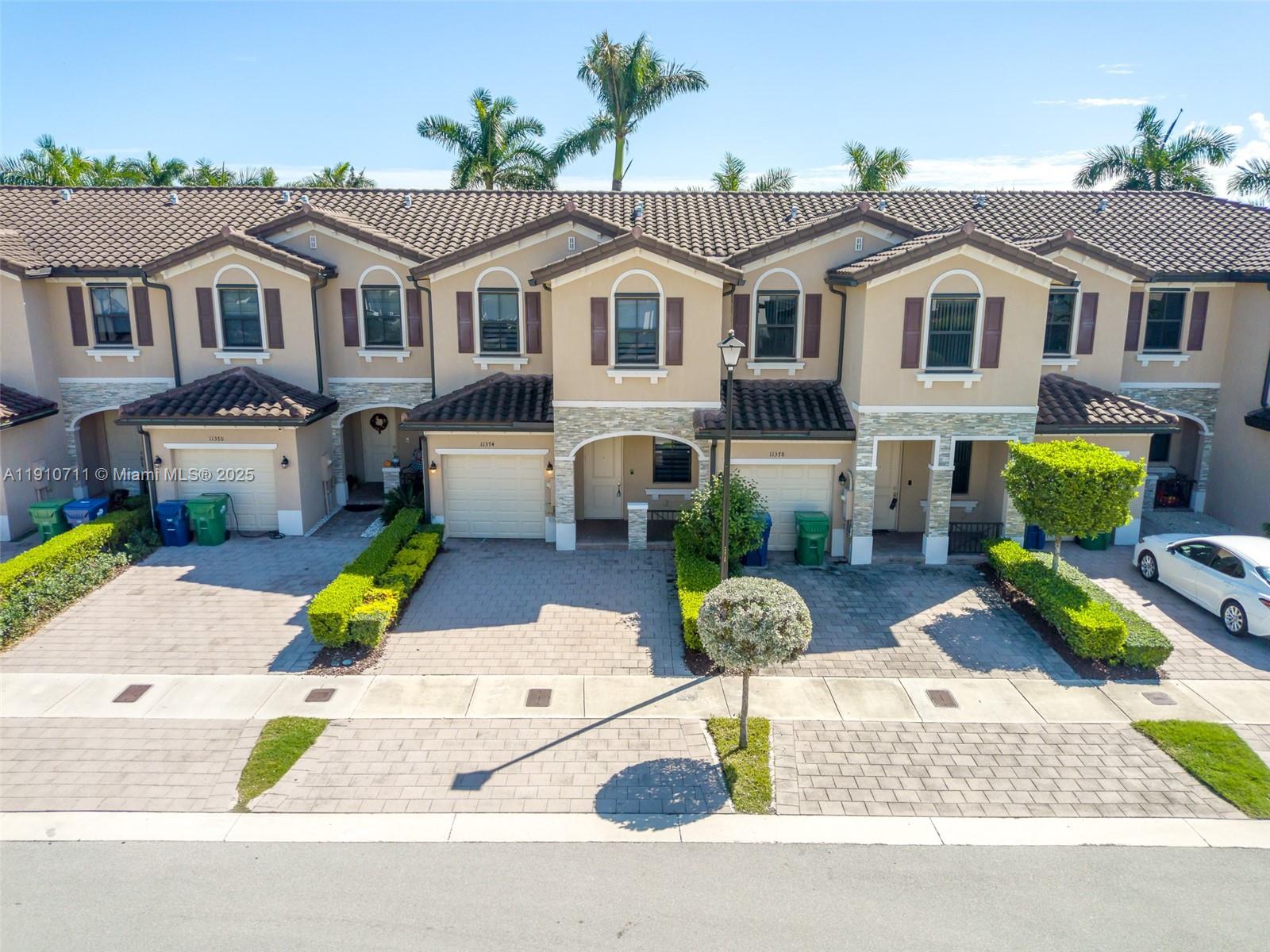 a view of multiple houses with a patio