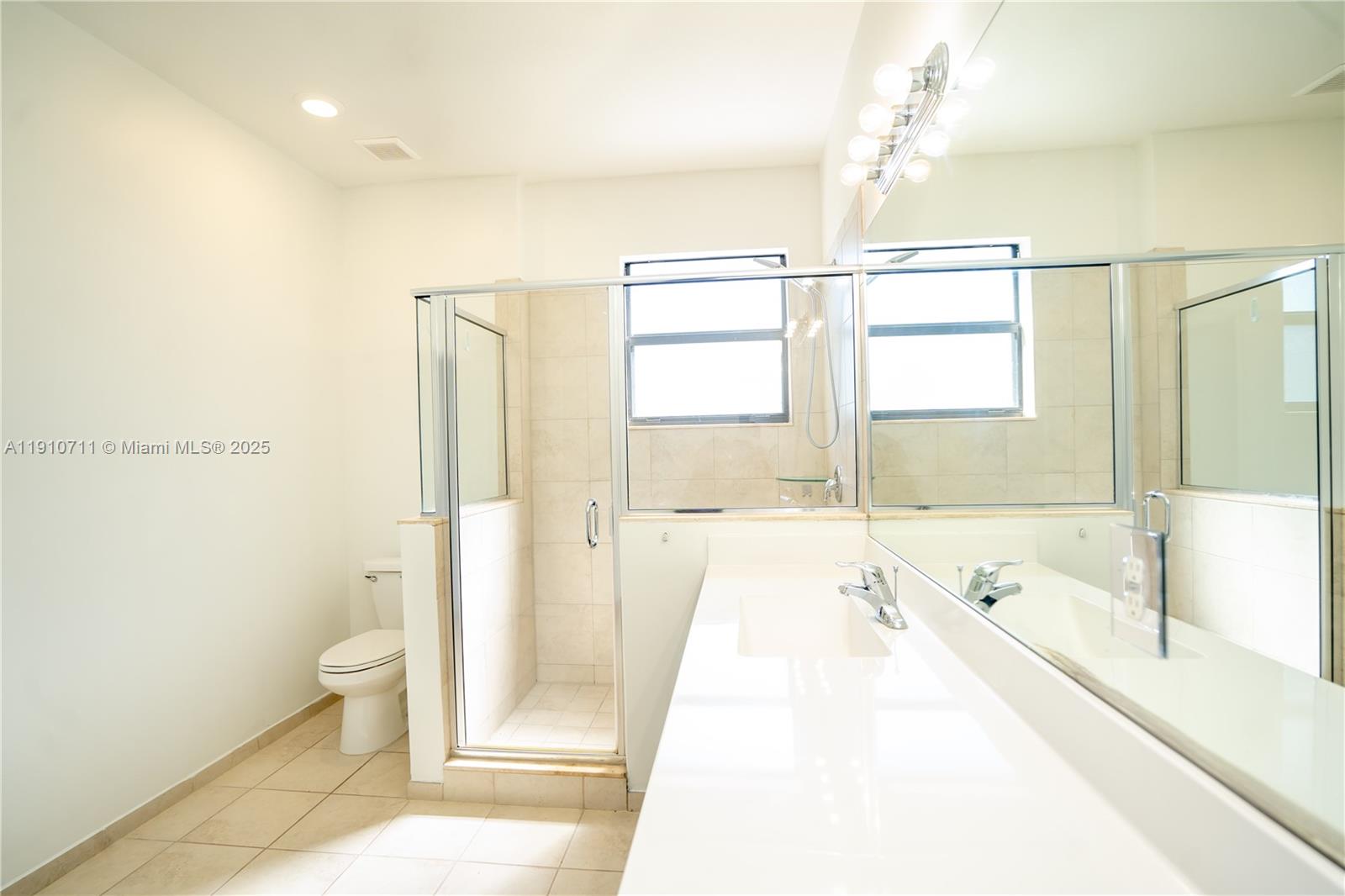 11374 Southwest 254th Terrace Homestead, FL 33032 - Photo 16 of 51 a spacious bathroom with a tub and shower