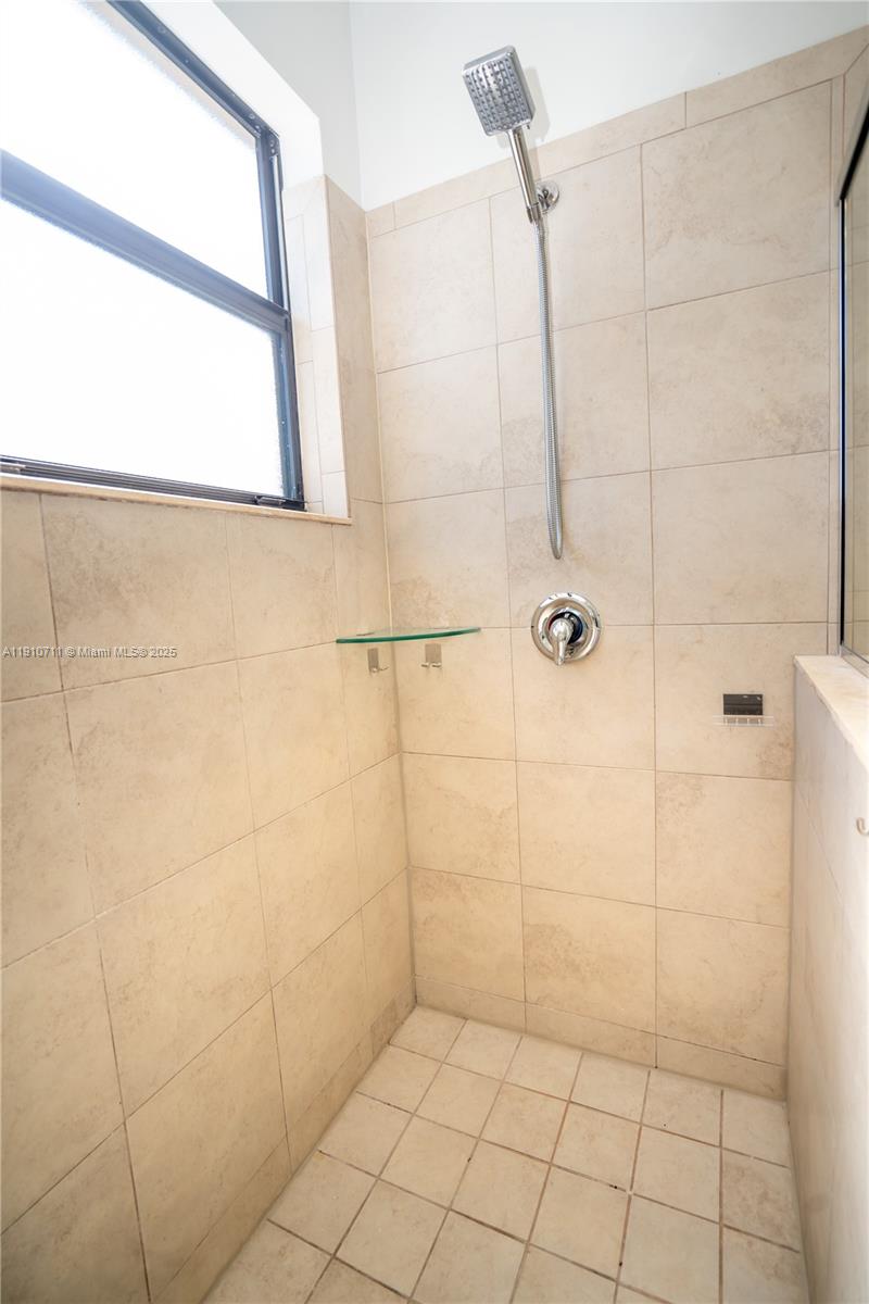 11374 Southwest 254th Terrace Homestead, FL 33032 - Photo 20 of 51 a bathroom with a shower
