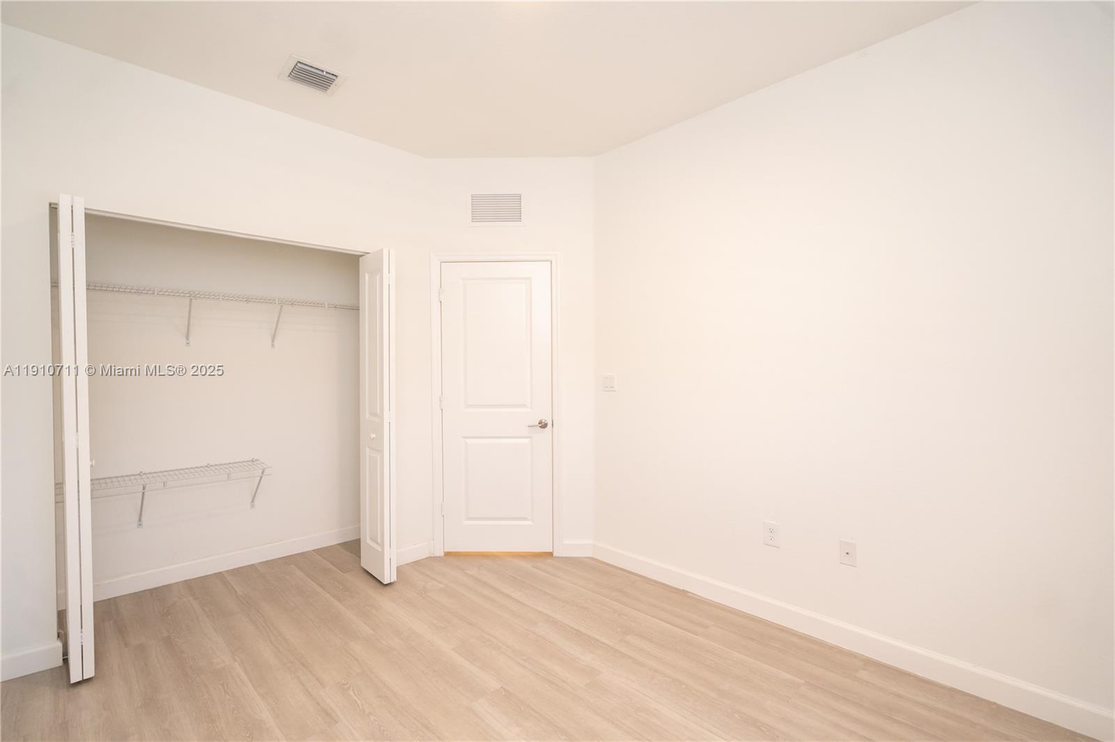 11374 Southwest 254th Terrace Homestead, FL 33032 - Photo 26 of 51 a view of an empty room