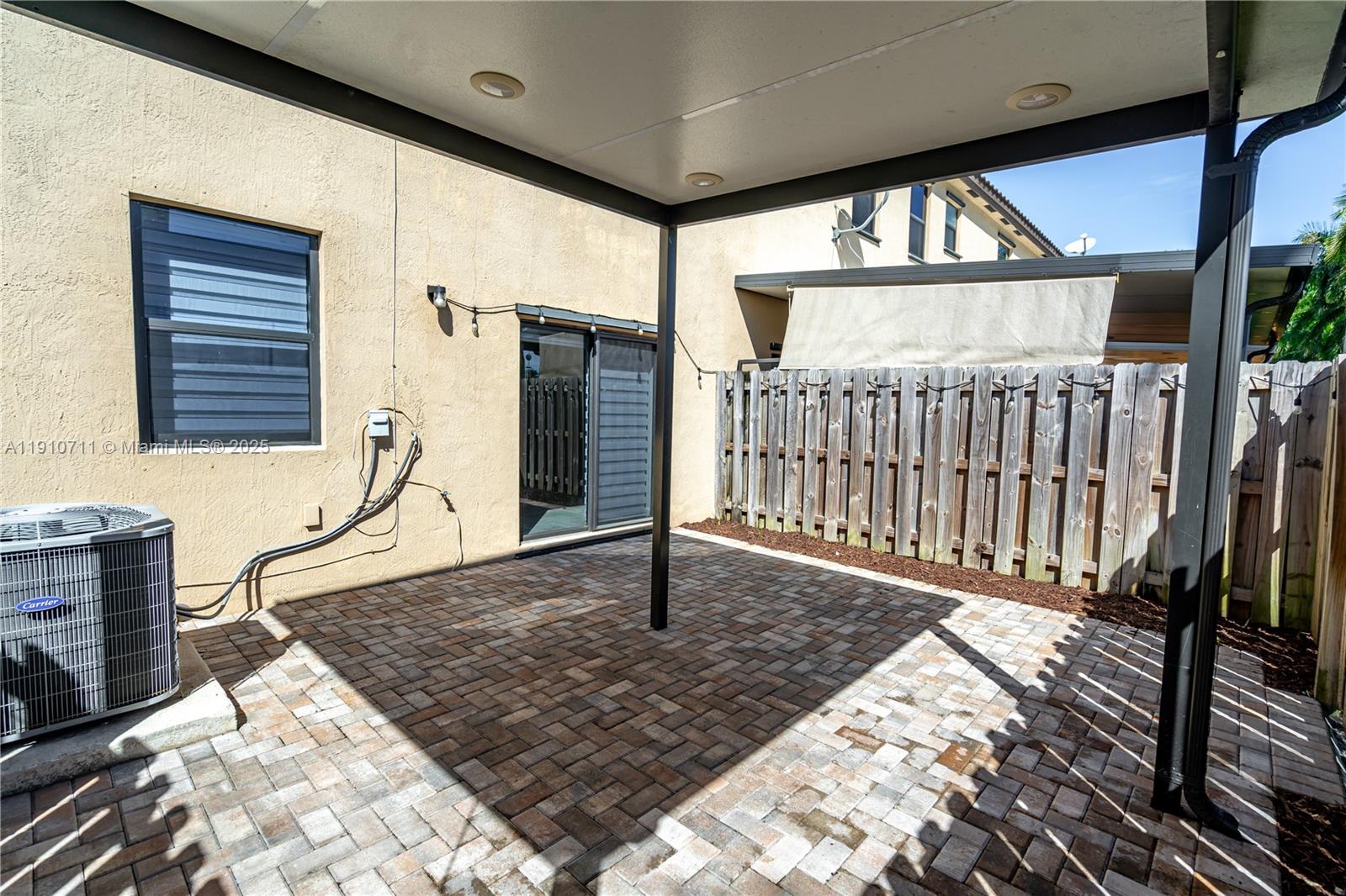 11374 Southwest 254th Terrace Homestead, FL 33032 - Photo 32 of 51 a porch with a rug