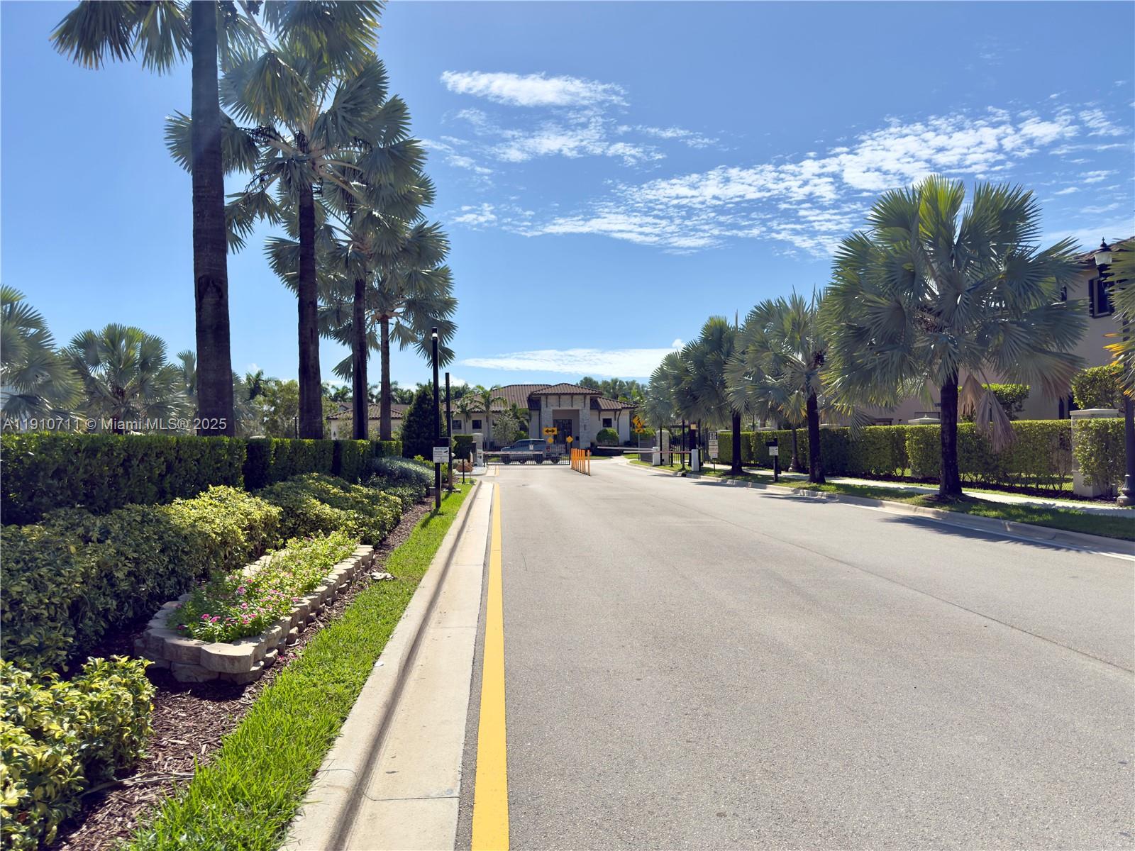 11374 Southwest 254th Terrace Homestead, FL 33032 - Photo 40 of 51 a view of a street with a houses