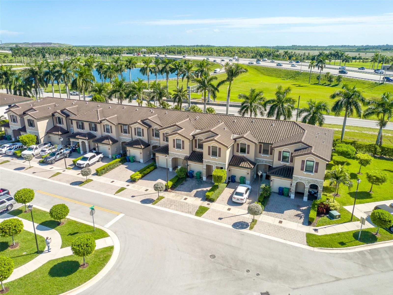 11374 Southwest 254th Terrace Homestead, FL 33032 - Photo 43 of 51 a view of swimming pool with outdoor seating and yard