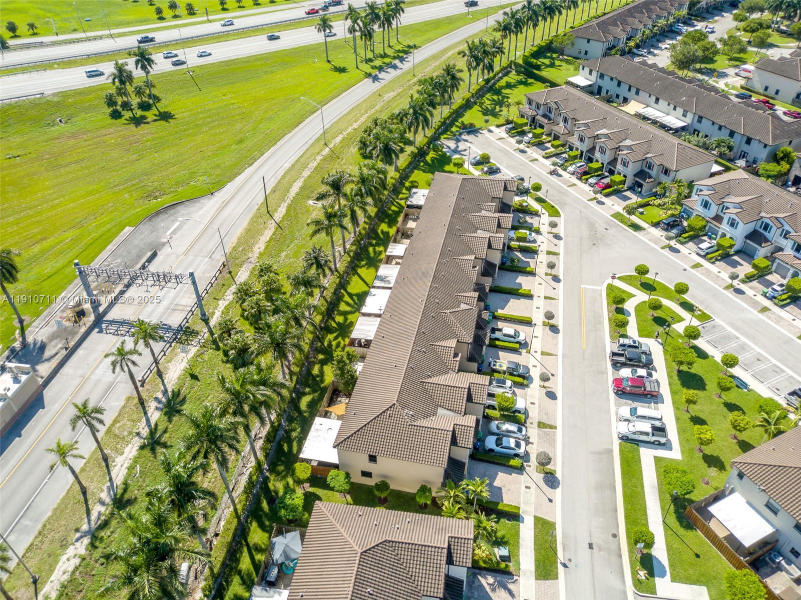 11374 Southwest 254th Terrace Homestead, FL 33032 - Photo 49 of 51 a view of a city with an ocean view